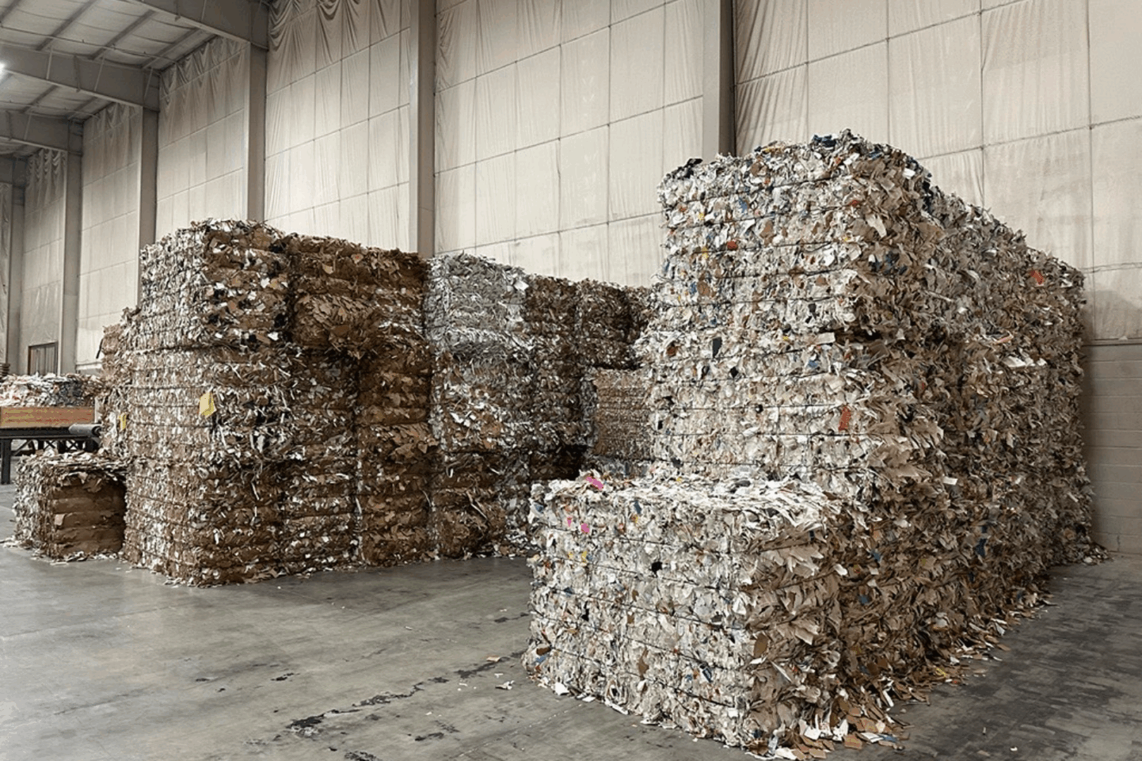 Recycled paper bales in a warehouse